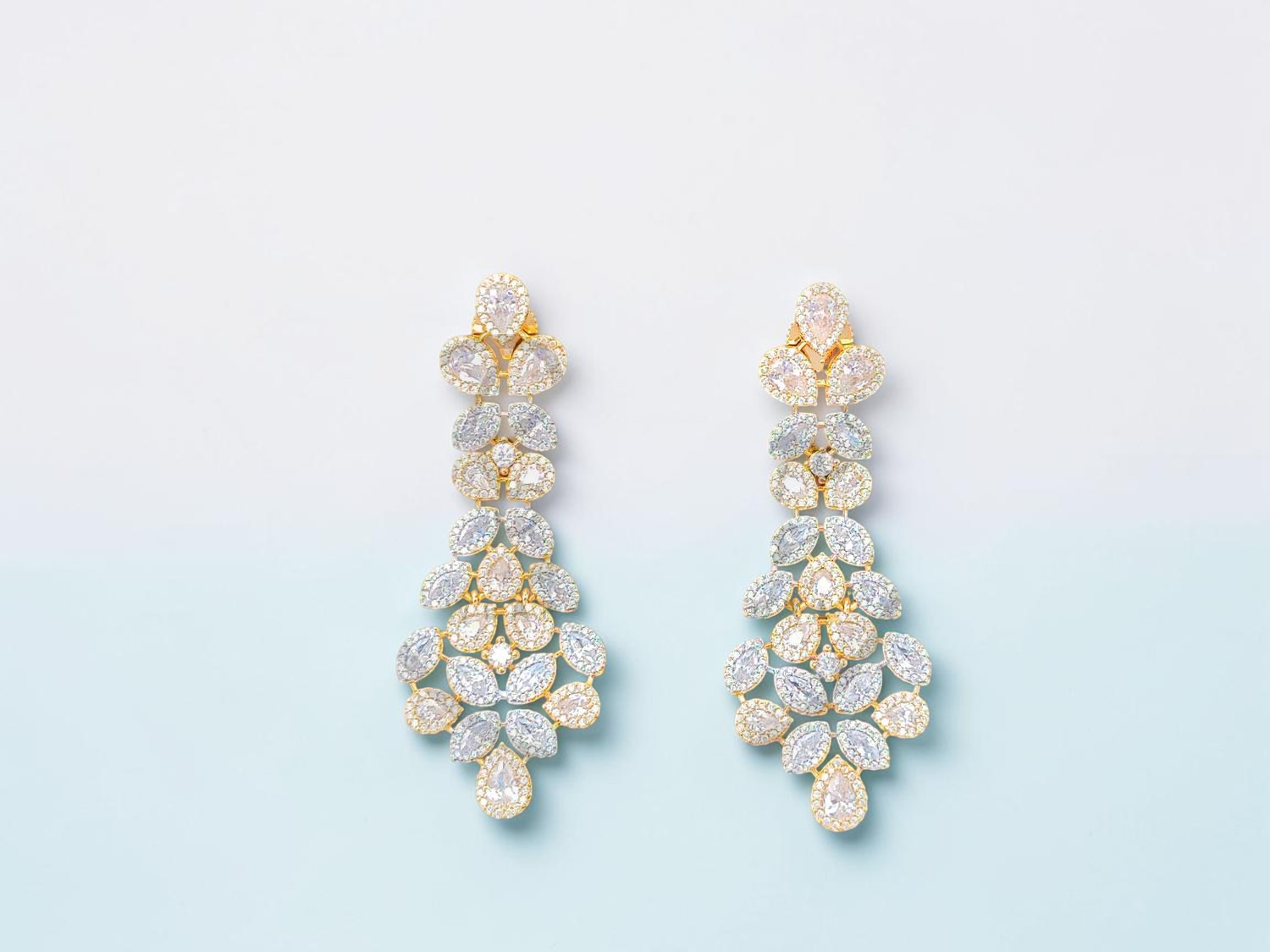 Exquisite Two-Tone Gold and Rhodium Chandelier Drop Earrings.