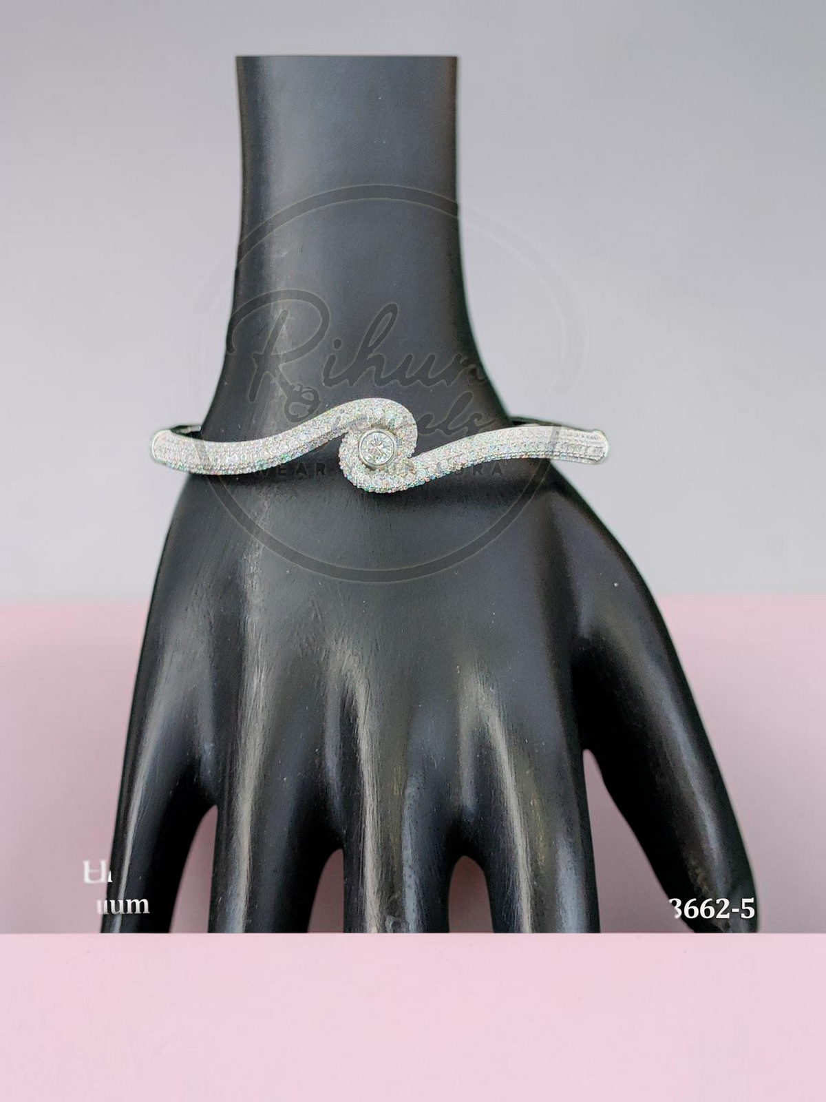 Elegant Serpentine Solitaire Wave Kada Bracelet.