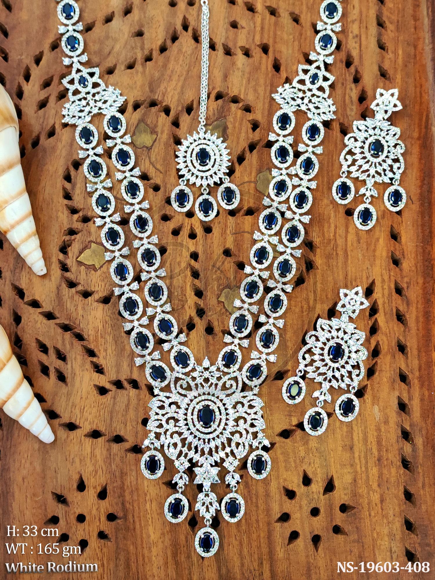White Rhodium Plated Mint Green Stone Long Haram Necklace Set with Mang Tika and Earrings.