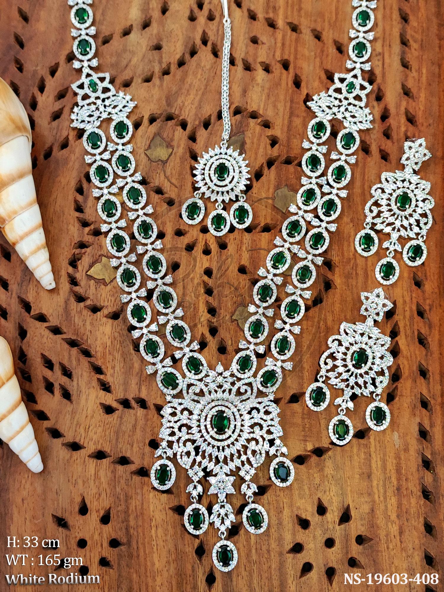 White Rhodium Plated Mint Green Stone Long Haram Necklace Set with Mang Tika and Earrings.
