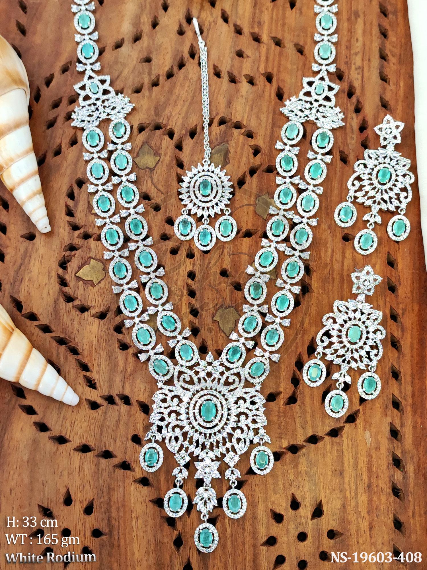 White Rhodium Plated Mint Green Stone Long Haram Necklace Set with Mang Tika and Earrings.
