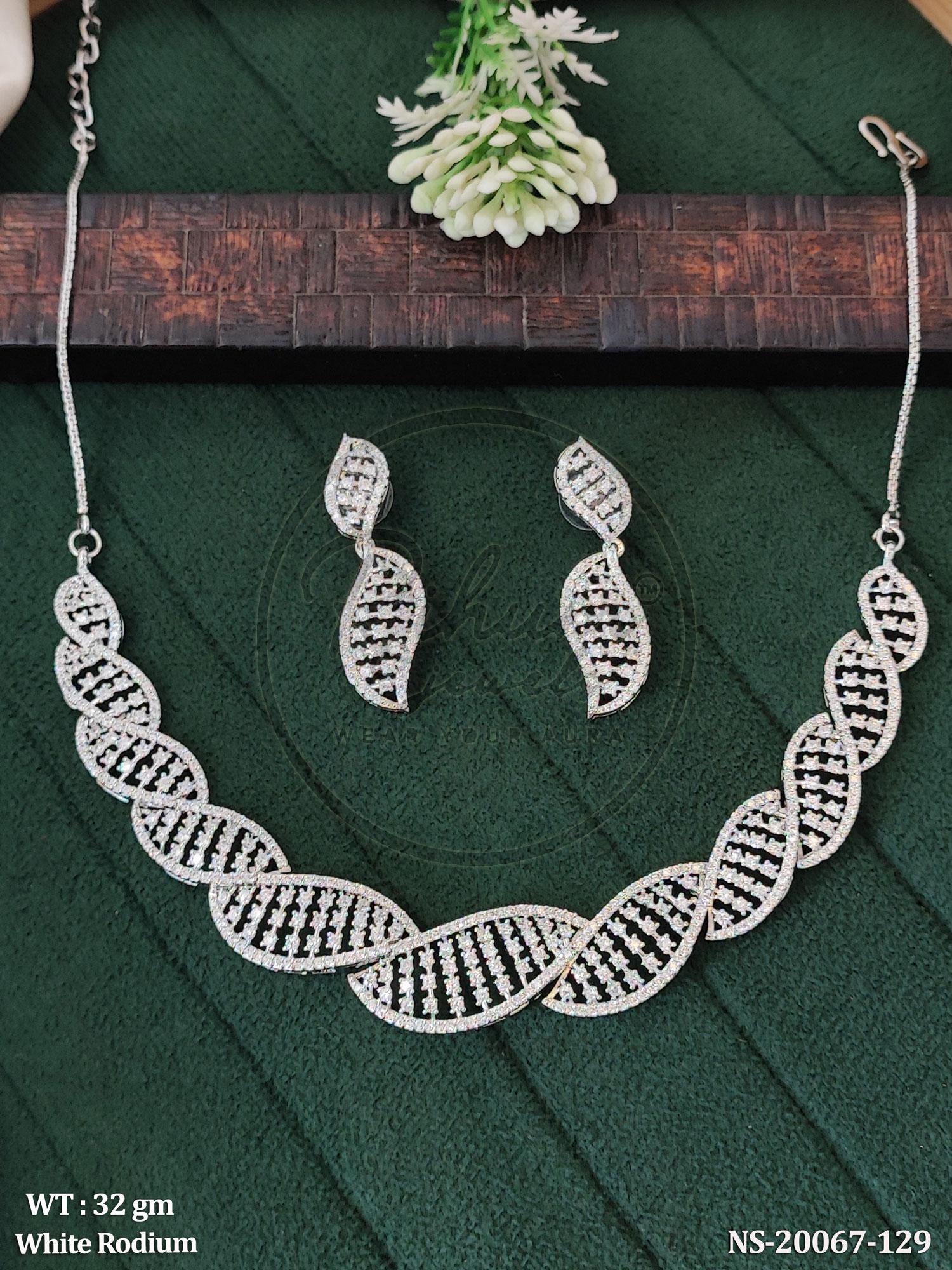 DNA-Inspired White Rhodium Plated CZ/AD Necklace Set with Matching Leaf Earrings.