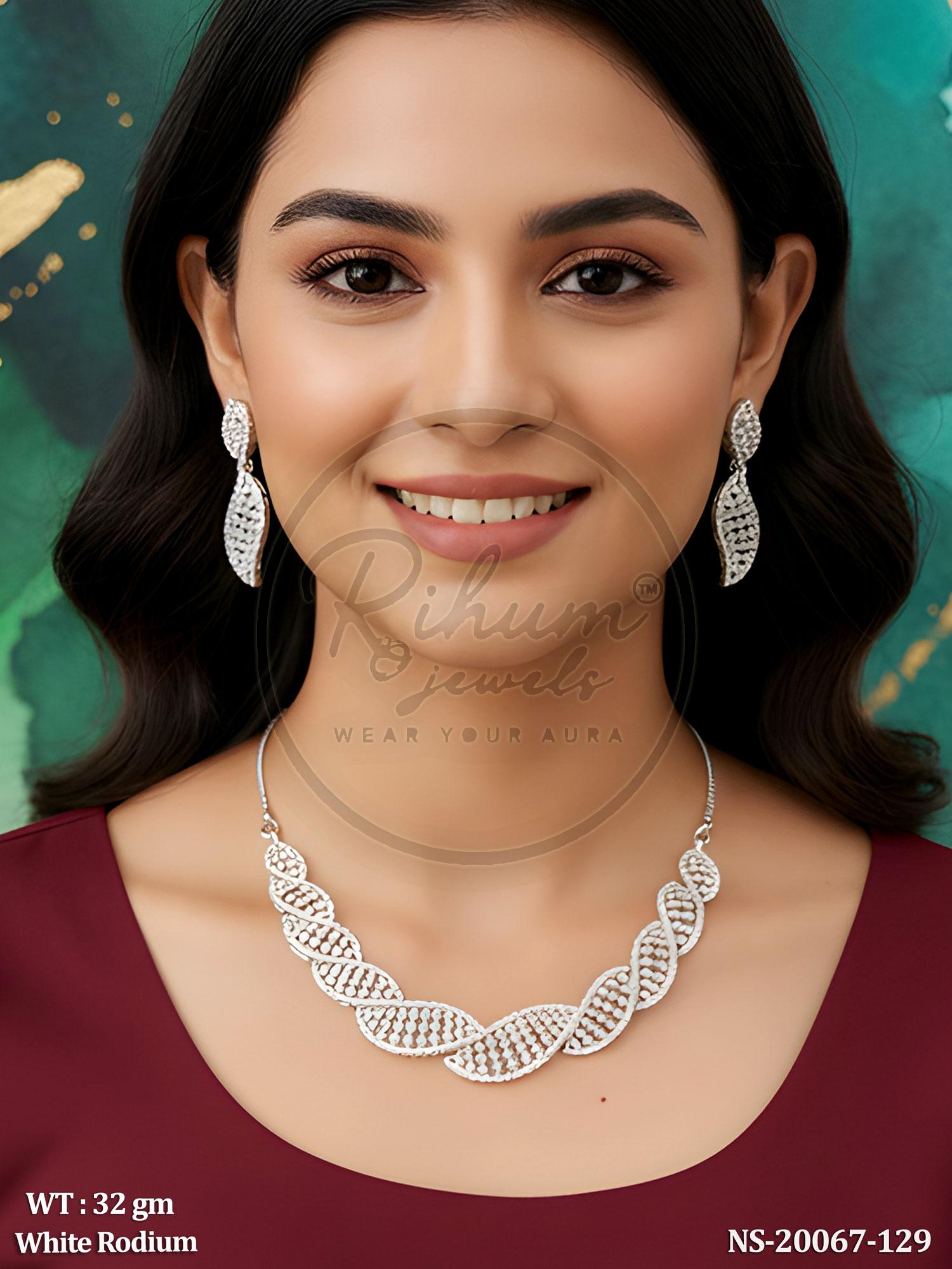 DNA-Inspired White Rhodium Plated CZ/AD Necklace Set with Matching Leaf Earrings.