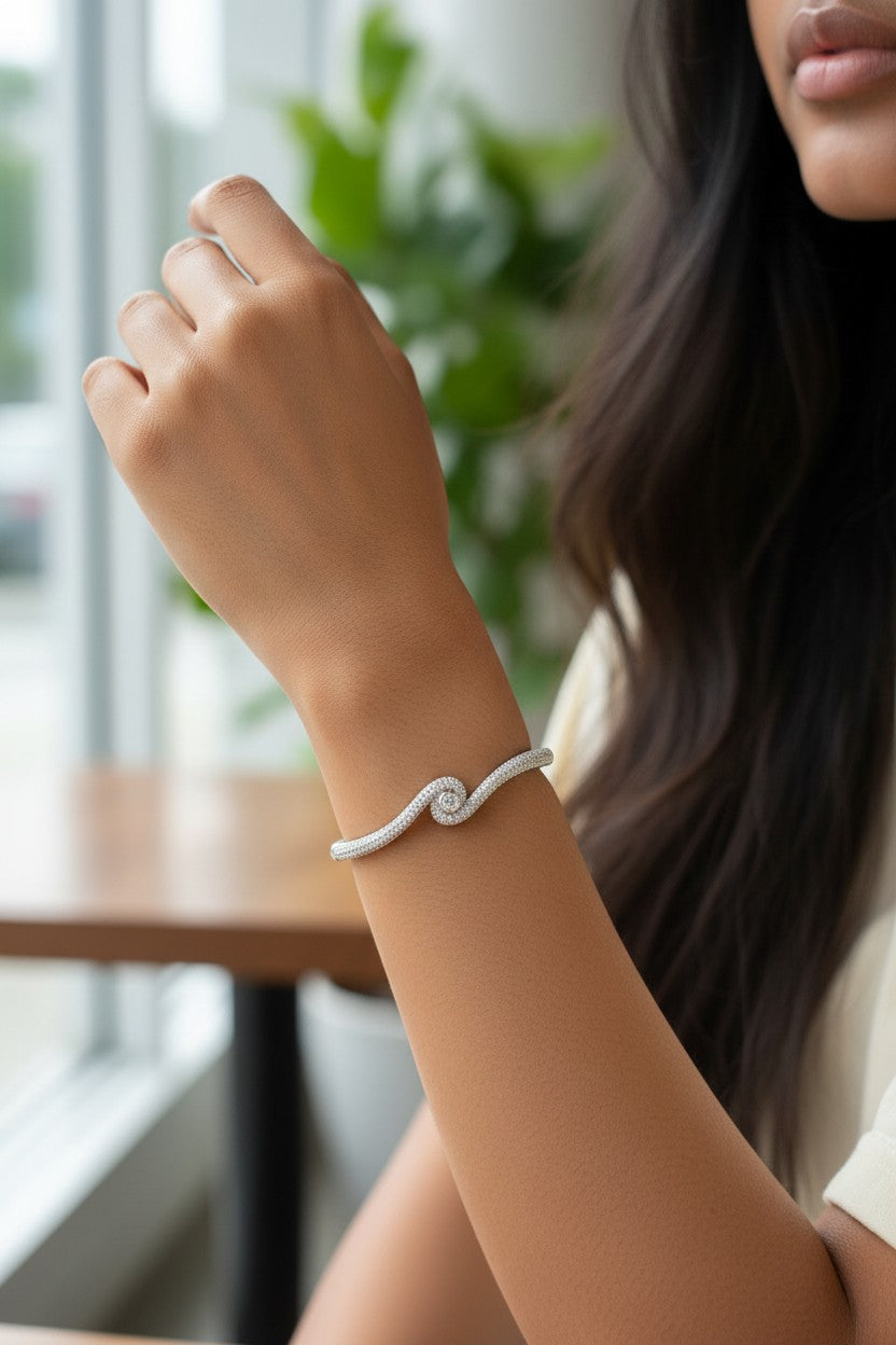 Elegant Serpentine Solitaire Wave Kada Bracelet.