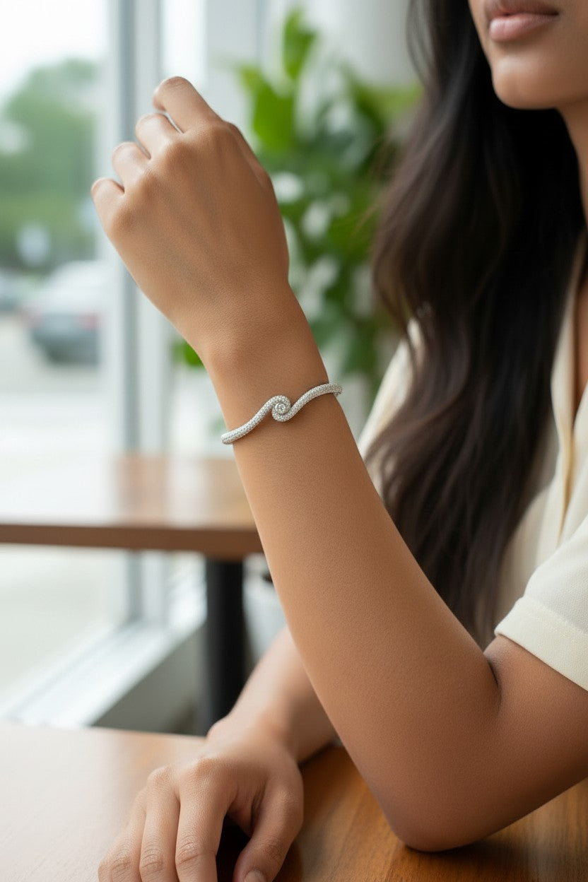 Elegant Serpentine Solitaire Wave Kada Bracelet.