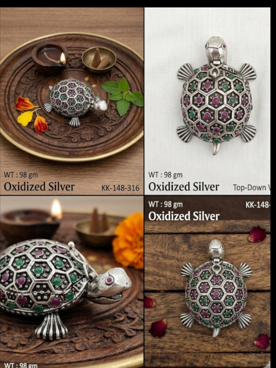 Rihum Jewels handcrafted oxidized silver tortoise sindoor box with ruby and emerald stone accents for Vastu decor